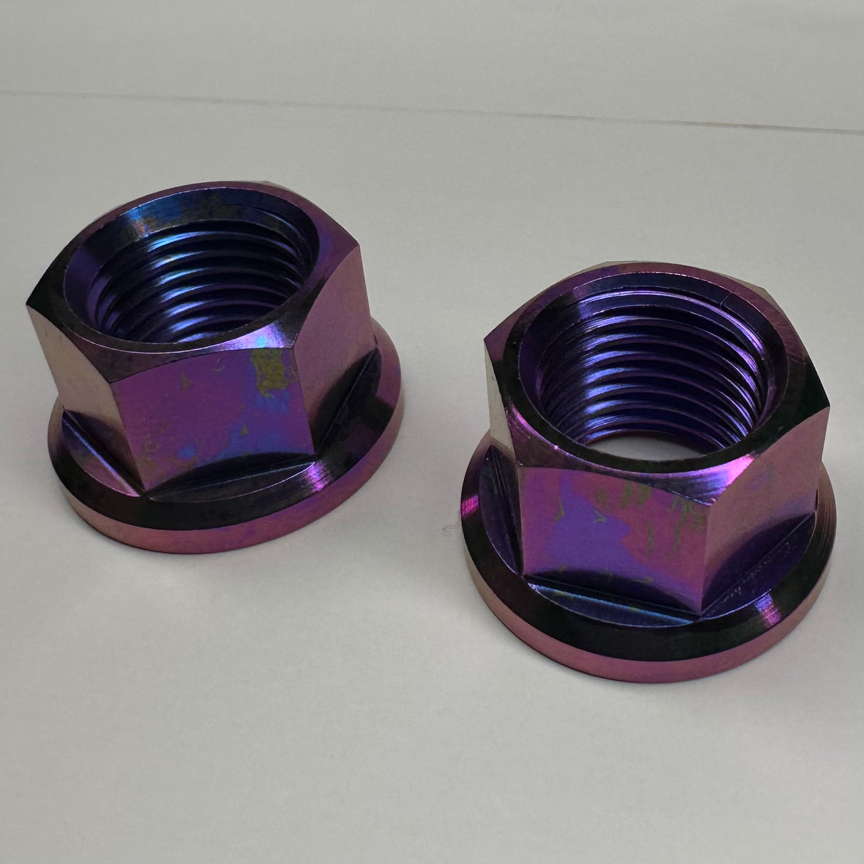 Surron titanium rear axle nut