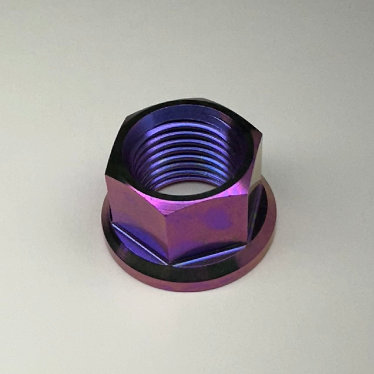 Surron titanium rear axle nut